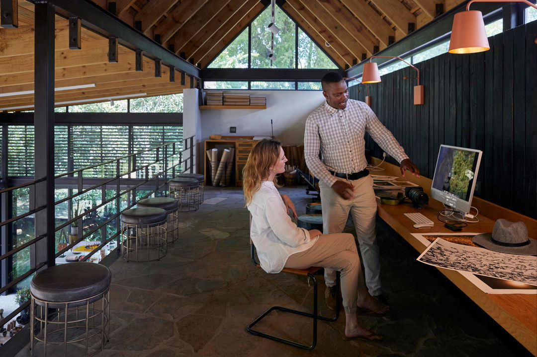 lady guest and guide in creative lab of lion sands river lodge