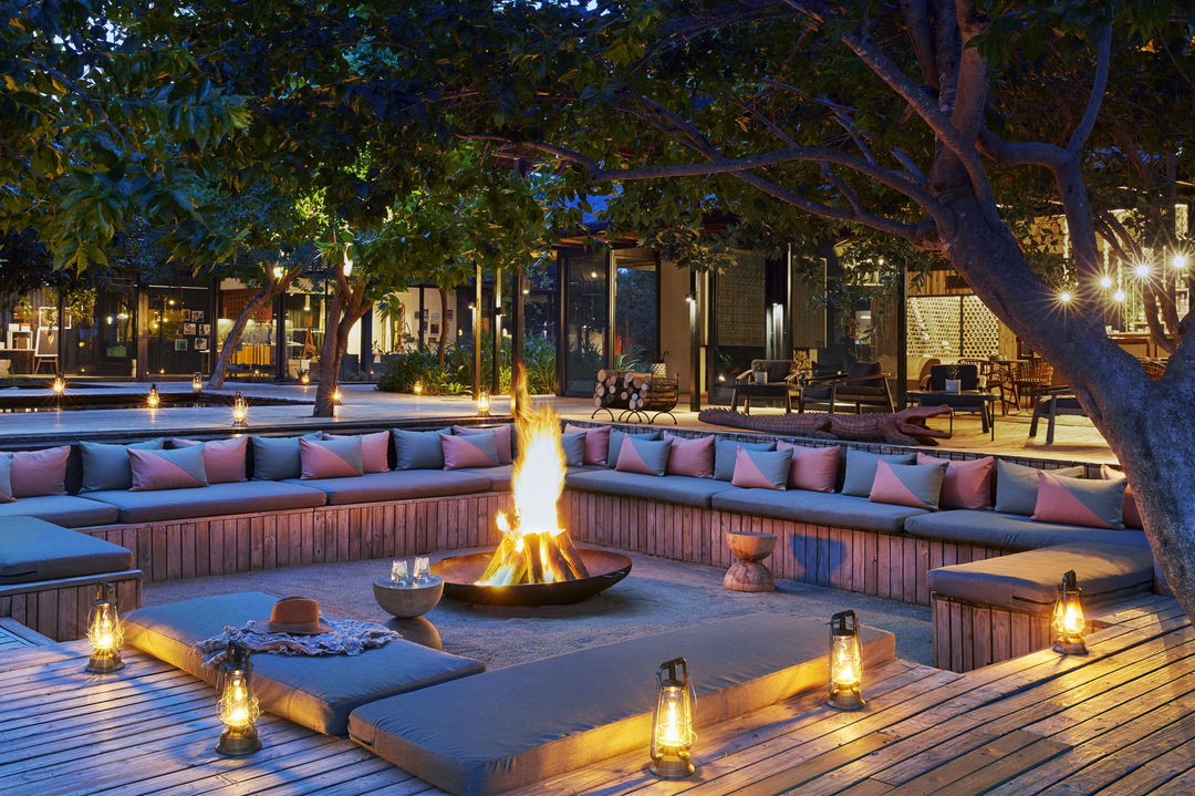 evening view of firedeck at lion sands river lodge
