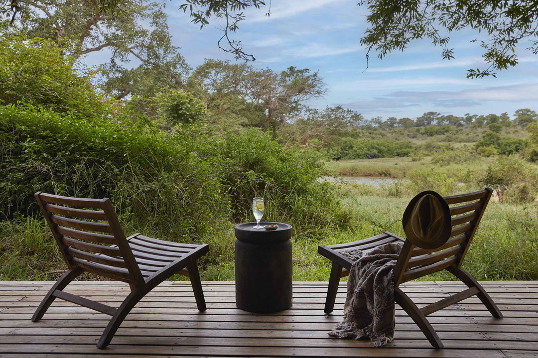 view from deck of luxury room at river lodge lion sands