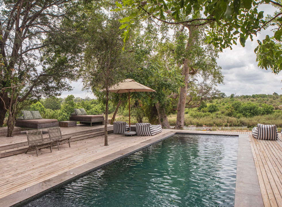 River Lodge main pool and deck by Lion Sands Game Reserve