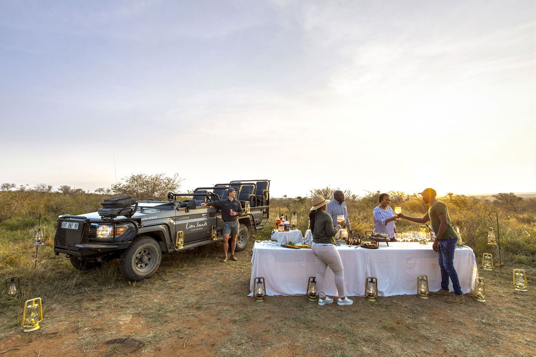 guests having refreshments on a bush stop at lion sands Tinga lodge
