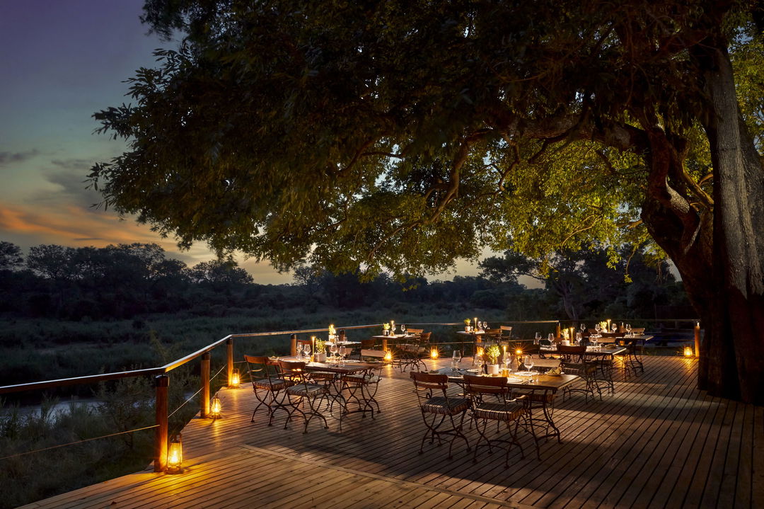 tinga lodge lion sands firedeck at night