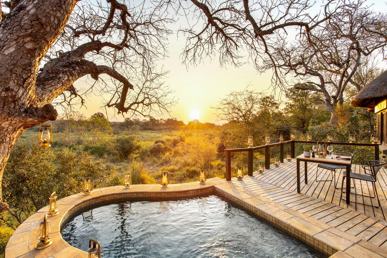 private suite splash pool deck with views of river at Tinga lodge Lion Sands Game Reserve