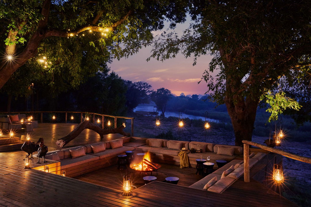 fire deck at night by ivory lodge at Lion Sands Game Reserve