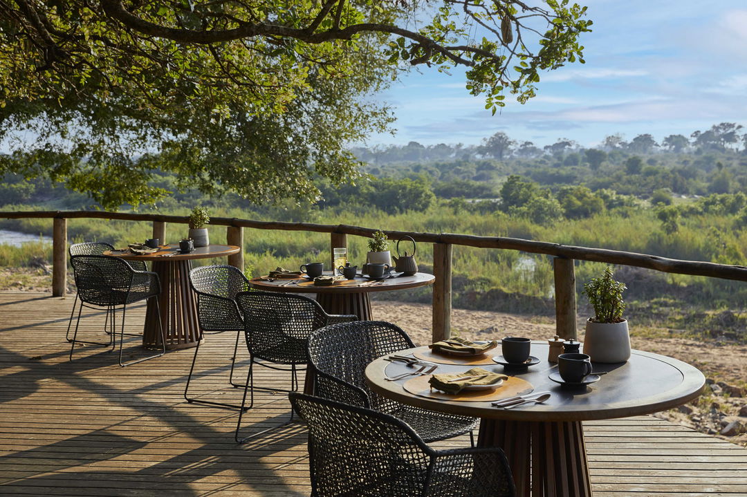 ivory lodge set for breakfast on deck by Lion Sands Game Reserve