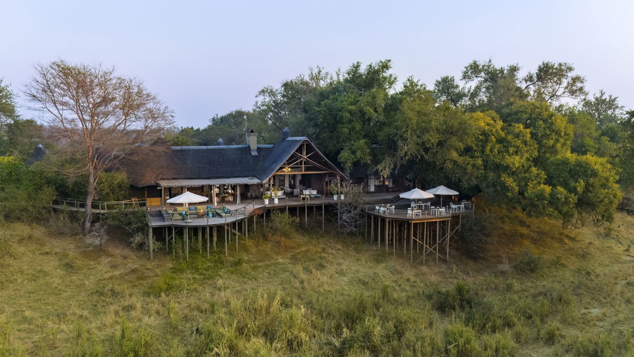 view of Nerina lodge from the river at Lion Sands Game Reserve