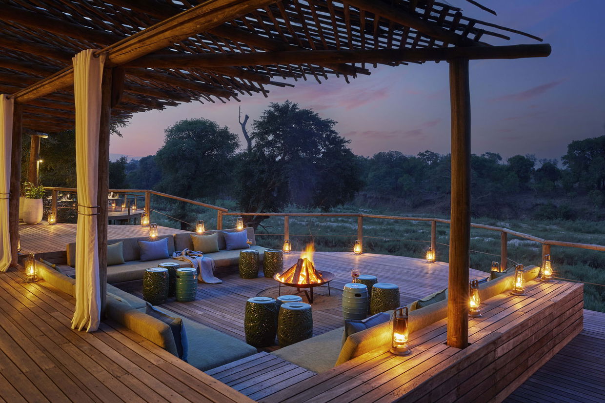 view of the fire pit on deck by Nerina Lodge Lion Sands Game Reserve
