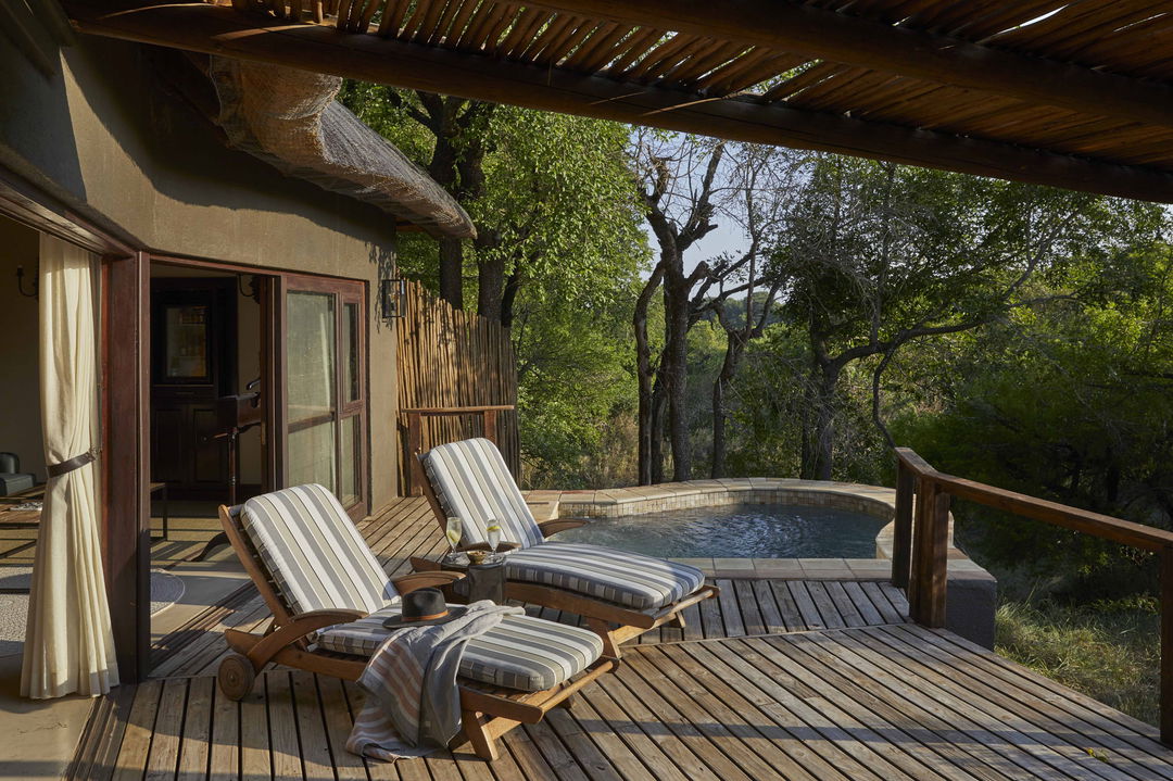 outside deck with loungers at Tinga lodge Lion Sands Game Reserve