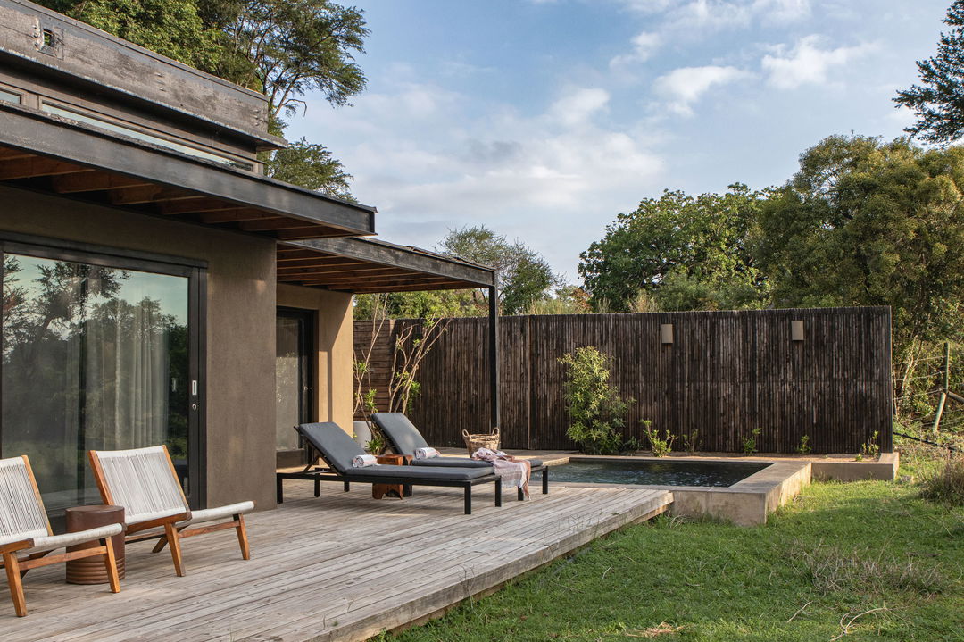 outside patio of suite at river lodgeLion Sands Game Reserve