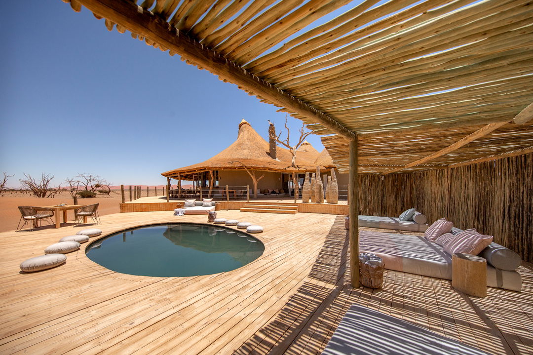pool and deck with room at little Kulala camp wilderness Namibia