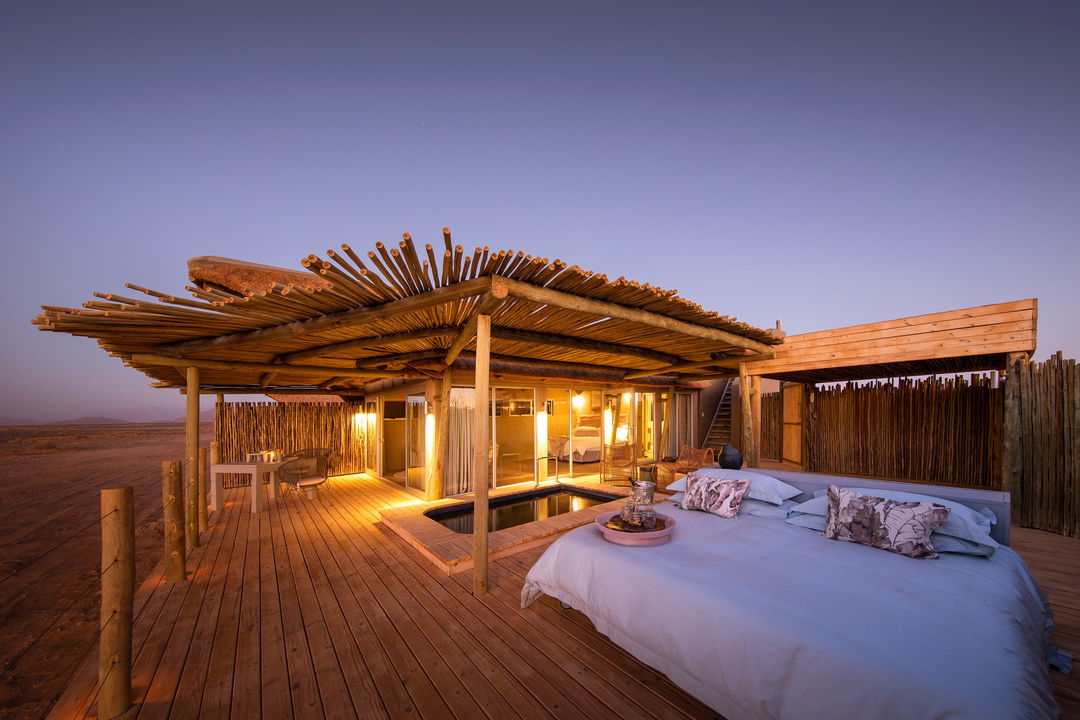 open air sleeping on deck at little Kulala camp wilderness Namibia