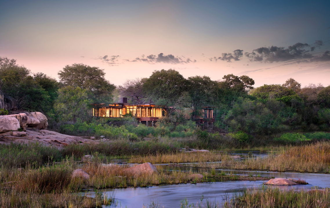 outside view of main lodge from river  at &Beyond Tengile River Lodge Sabi Sands