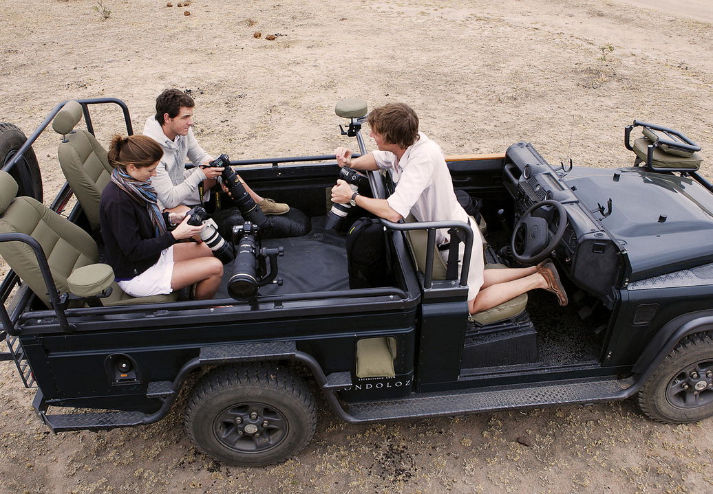 guests and guide on a photographic safari with Londolozi game reserve