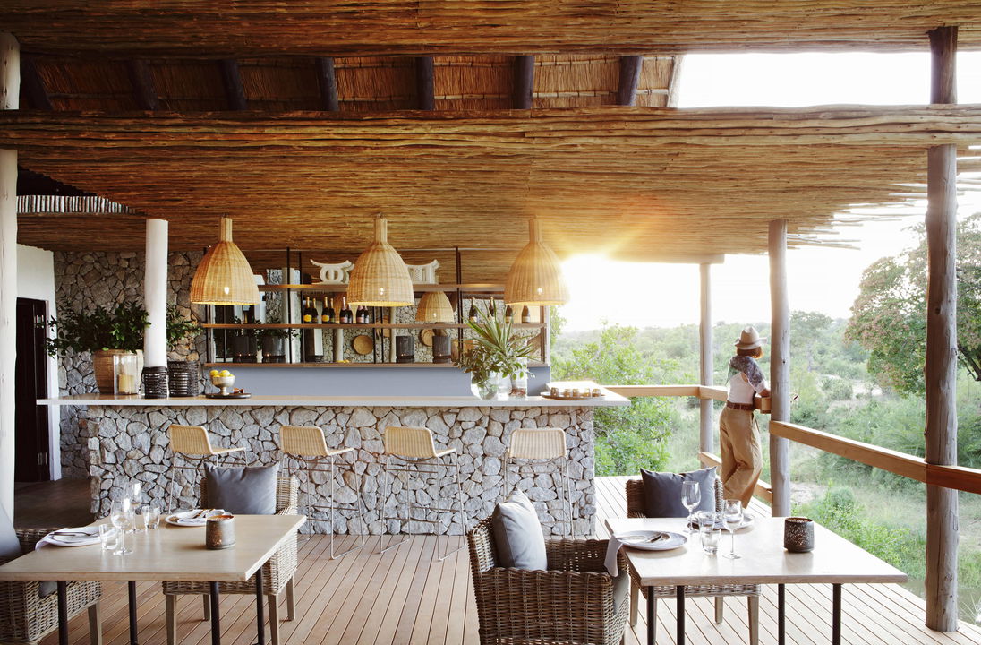 view of the bar area and deck at granite suites camp Londolozi