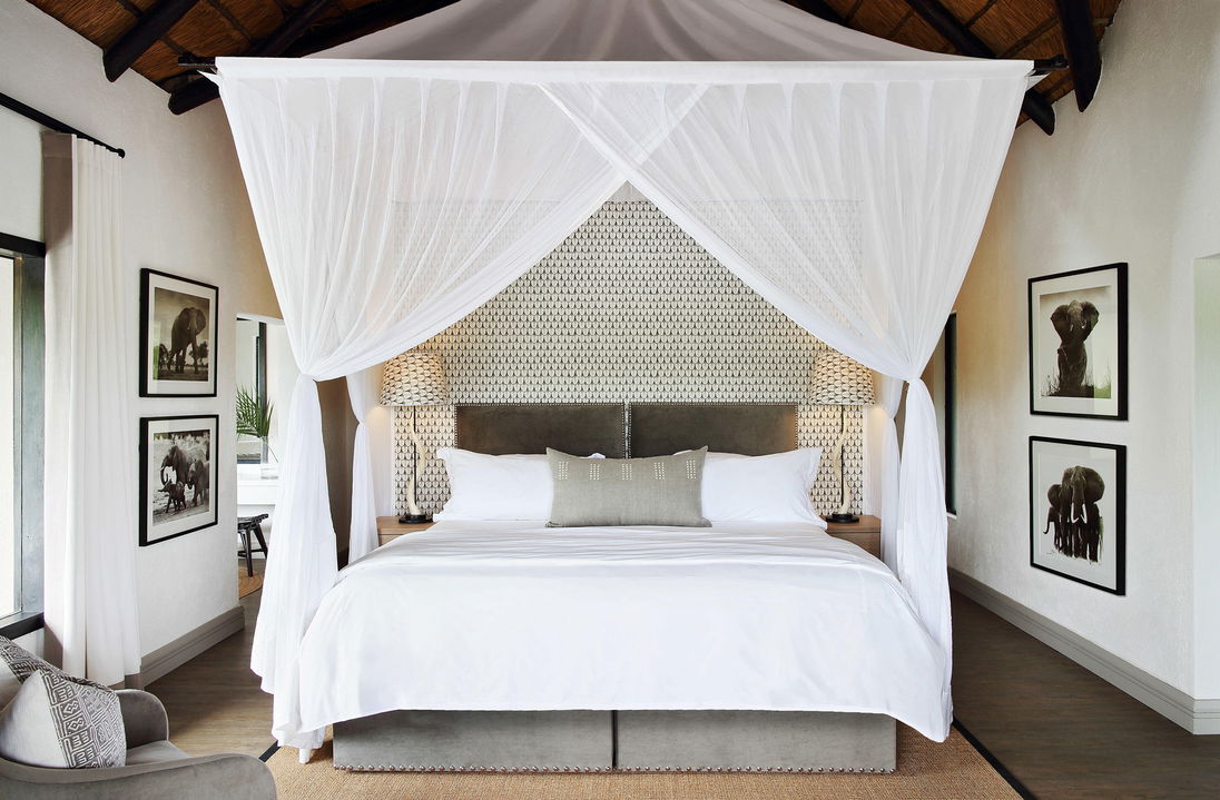 view of double bed in room of Granite suites camp Londolozi