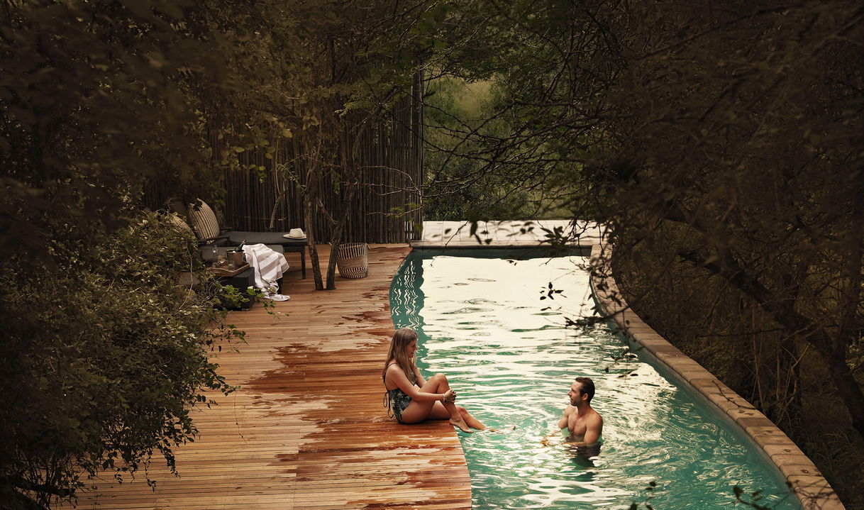 guests in the lap pool of Pioneer Camp Londolozi