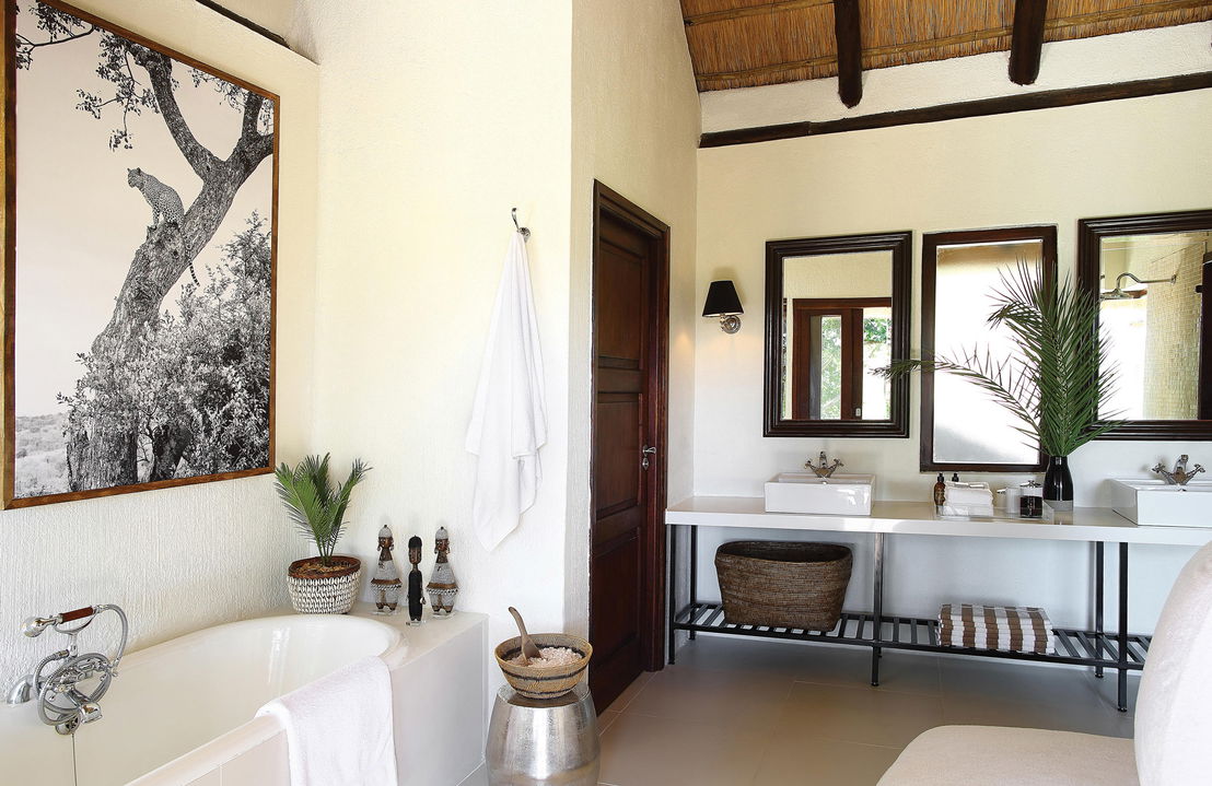 bathroom and vanity of a suite at Tree camp Londolozi
