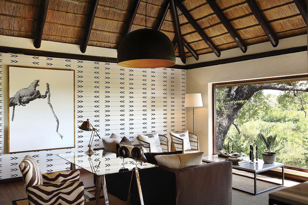 lounge area in a suite of tree camp Londolozi