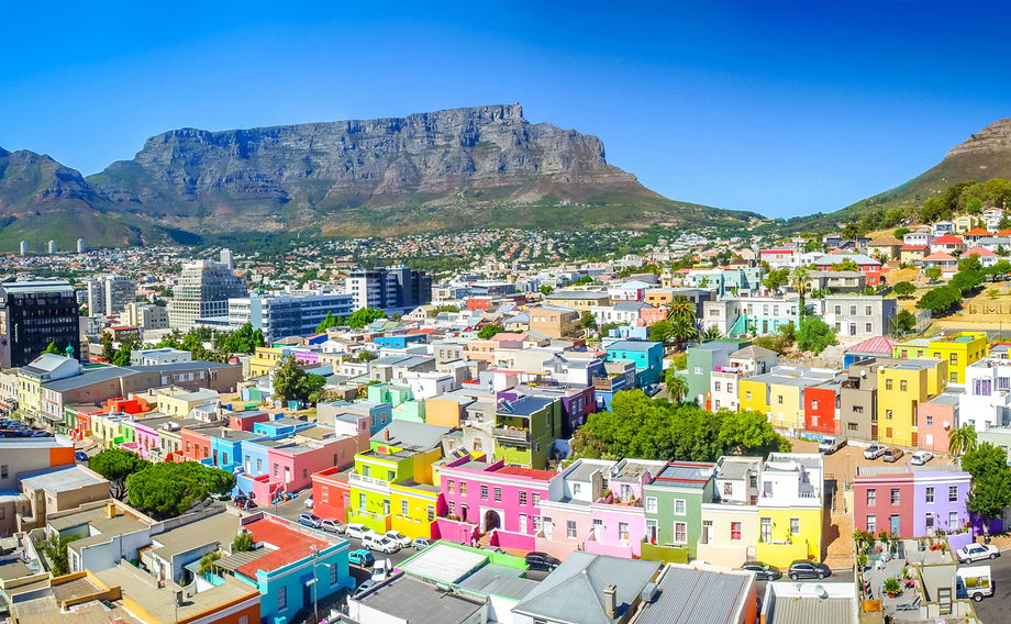 colourful houses of bo kaap Malay neighbourhood in front of table mountain