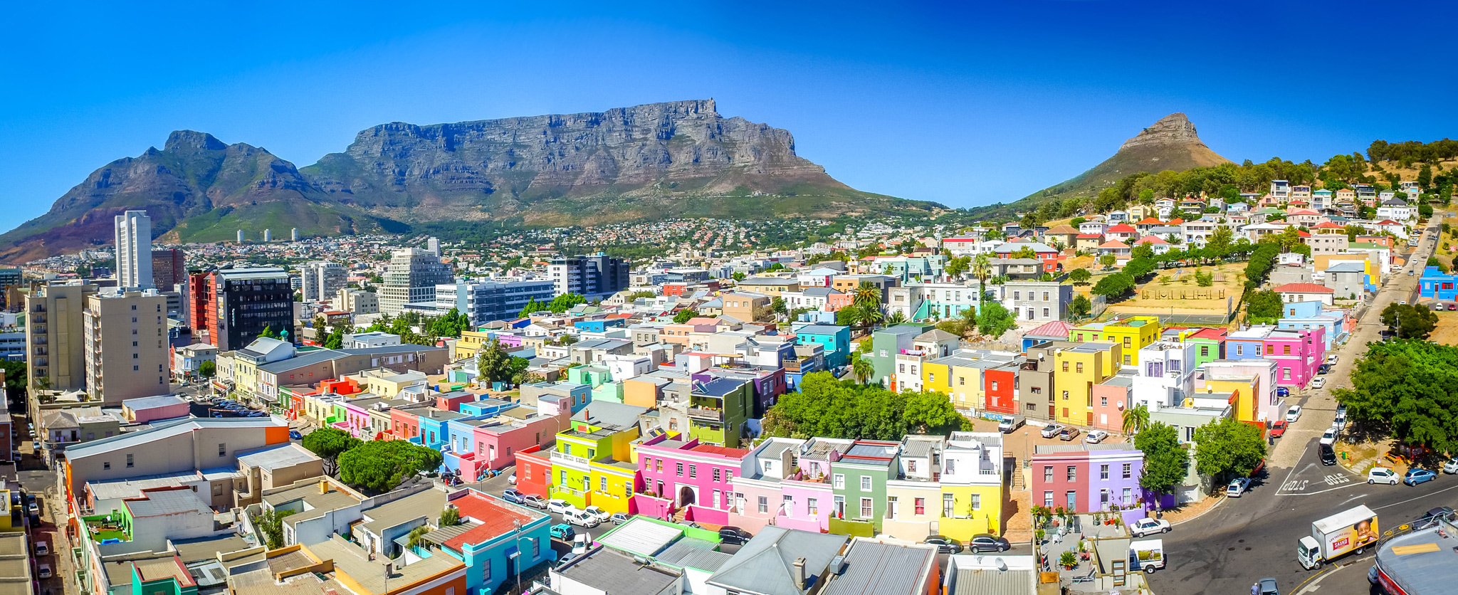 colourful houses of bo kaap Malay neighbourhood in front of table mountain