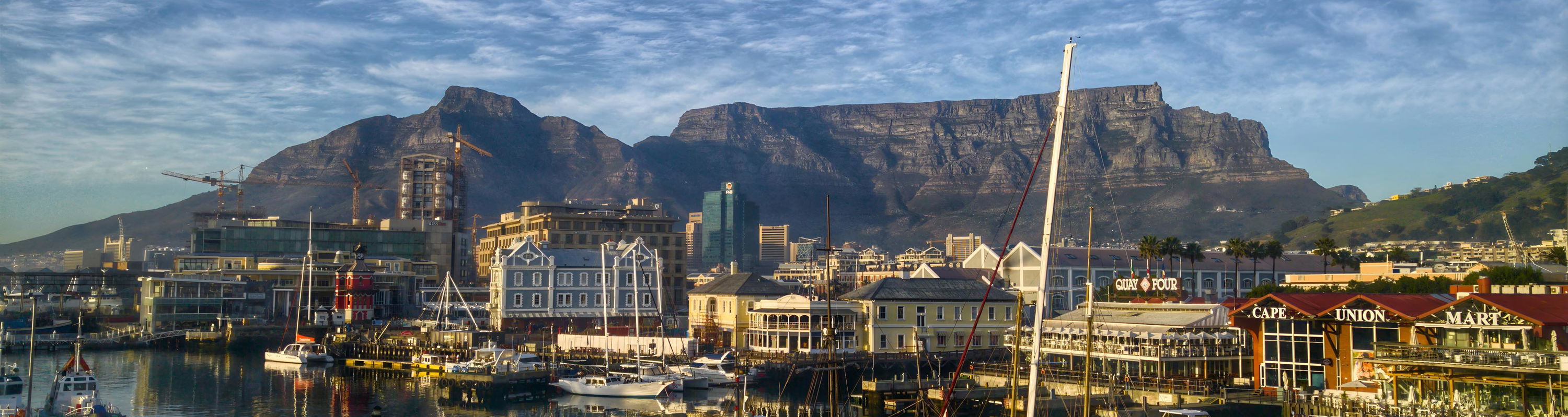 Victoria and Alfred Waterfront in Cape town with Table Mountain in backdrop 