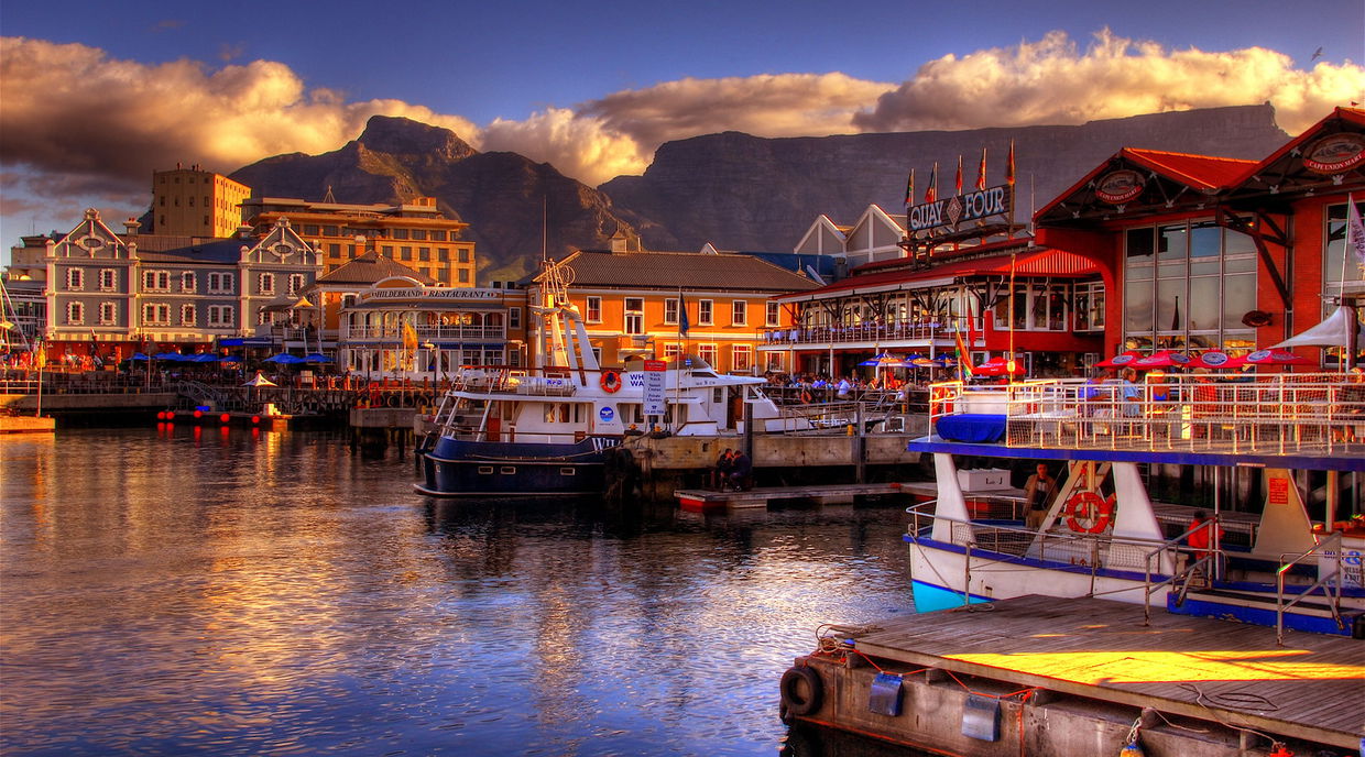 sunset view of V&A waterfront cape town with table mountain in backdrop