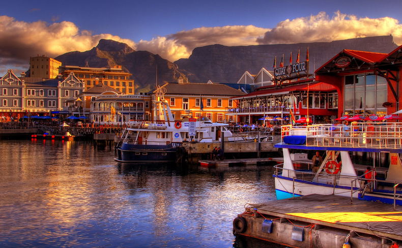 sunset view of V&A waterfront cape town with table mountain in backdrop