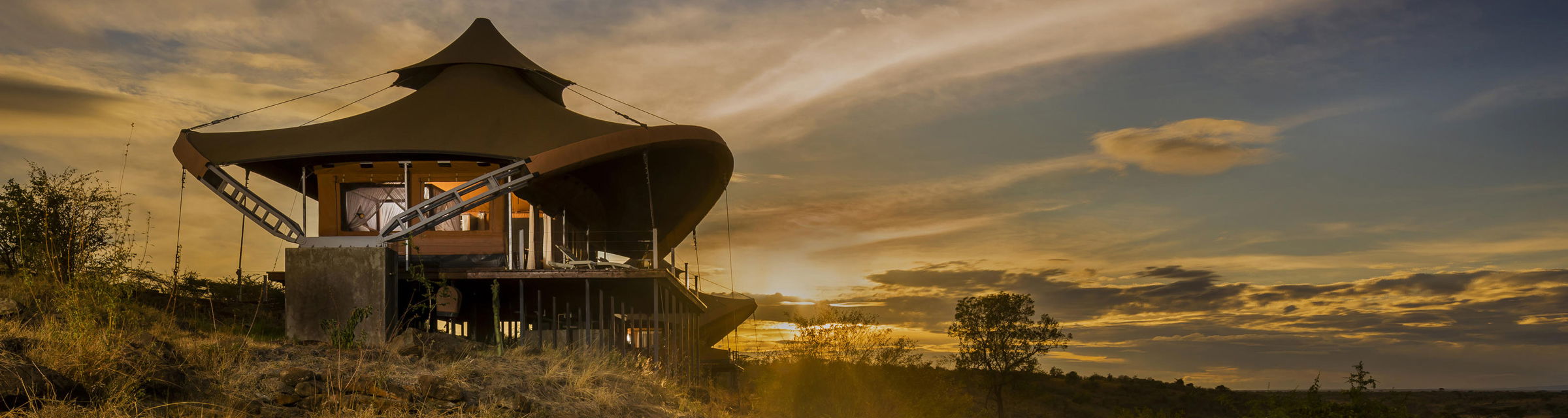Mahali Mzuri lodges from the outside at sunset in Kenya masai mara