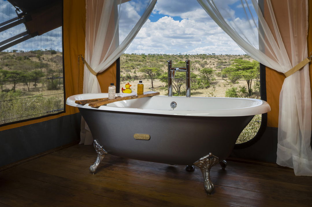 bathtub with open views in suite at Mahali Mzuri Kenya Masai Mara