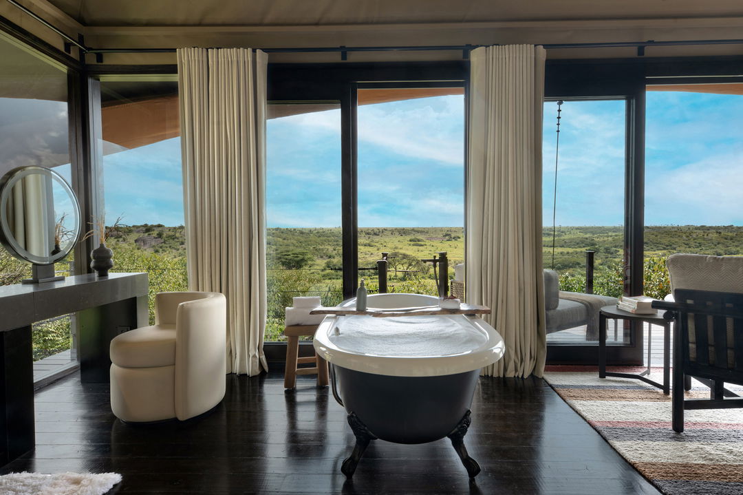 bathtub in bathroom with a view at Mahali Mzuri Kenya Masai Mara