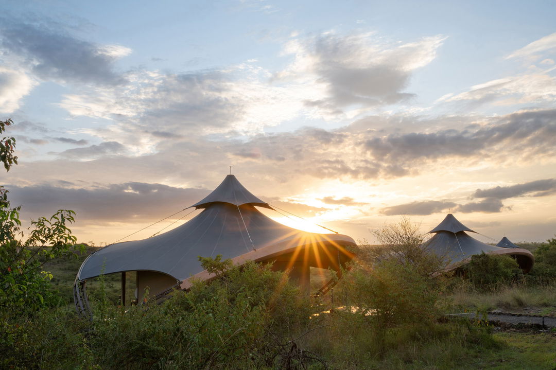 exterior view of a superior suite at Mahali Mzuri Kenya Masai Mara at sunset