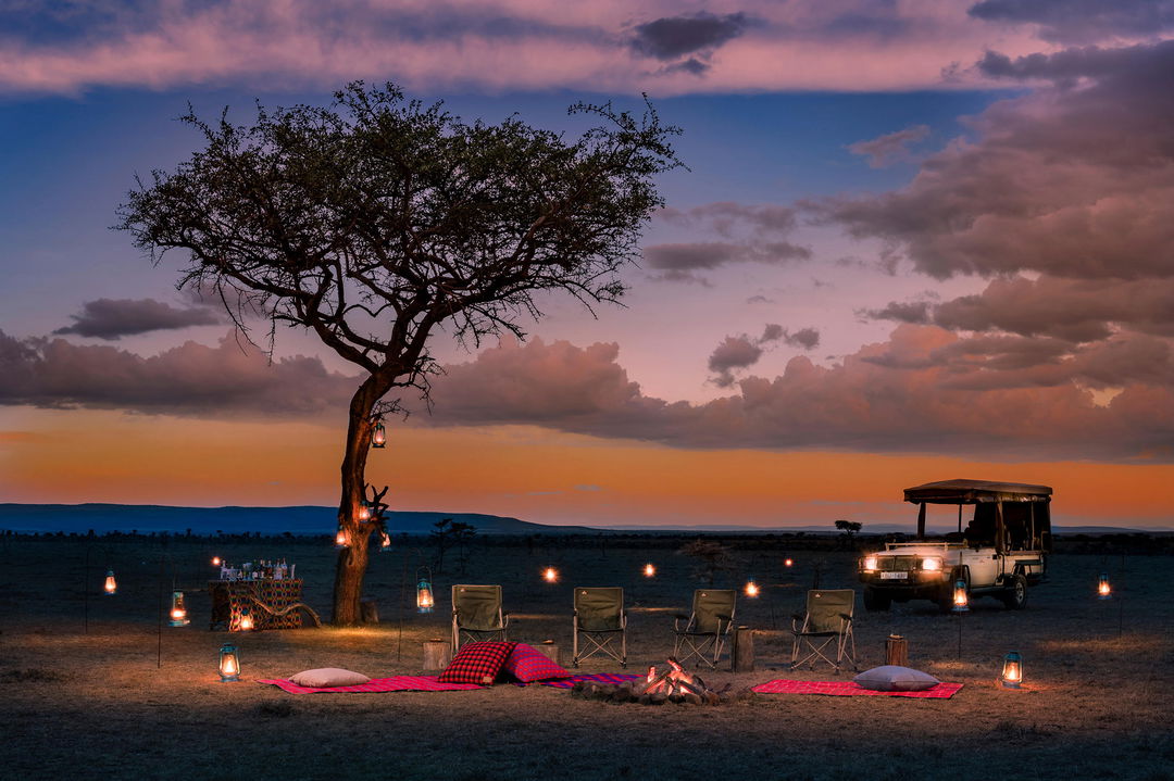 sundowners in the bush set up at sunset by Mahali Mzuri Kenya Masai Mara