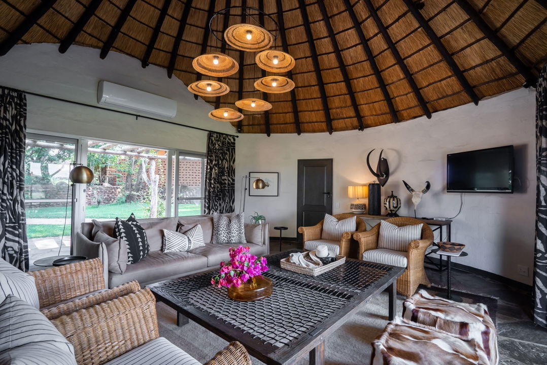 lounge area of a room at Sable Camp MalaMala