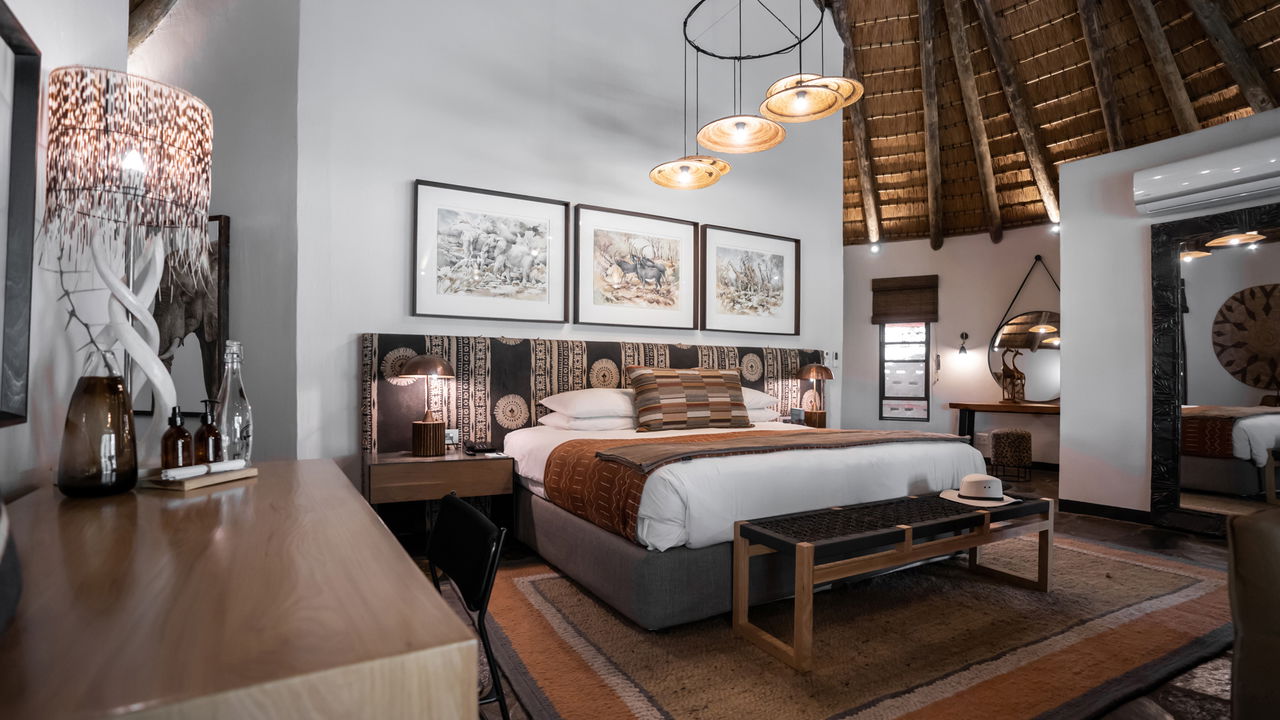 interior view of the bedroom of a room at Sable Camp MalaMala