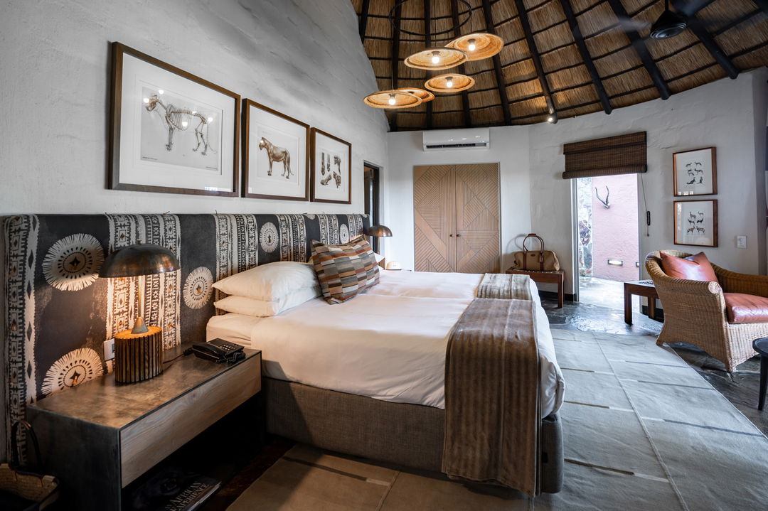 bedroom view of a luxury room at Sable Camp MalaMala