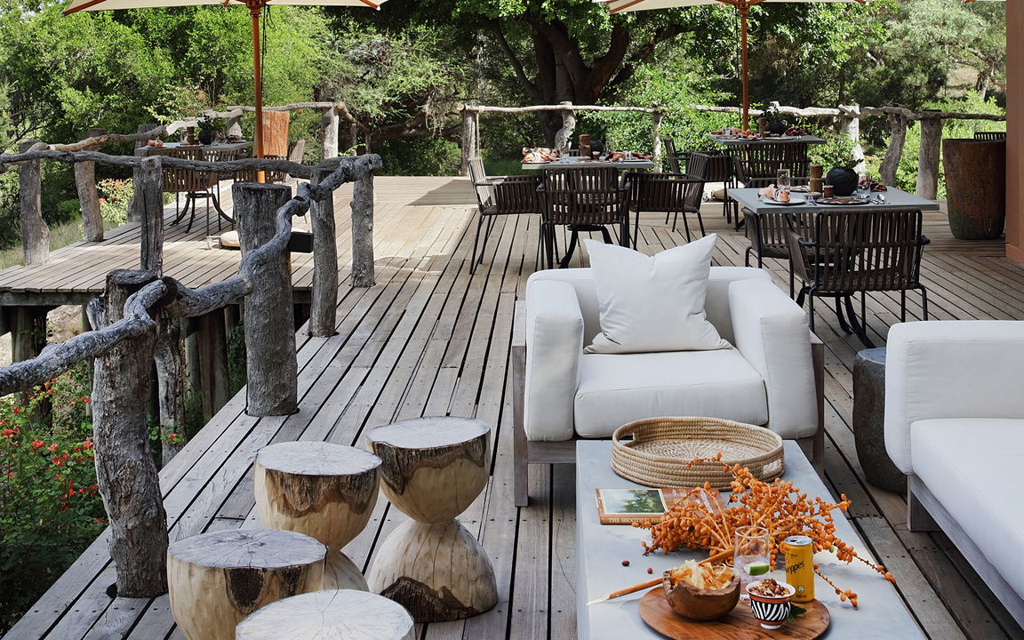 view of furniture on deck of main lodge at Sable Camp MalaMala Game Reserve