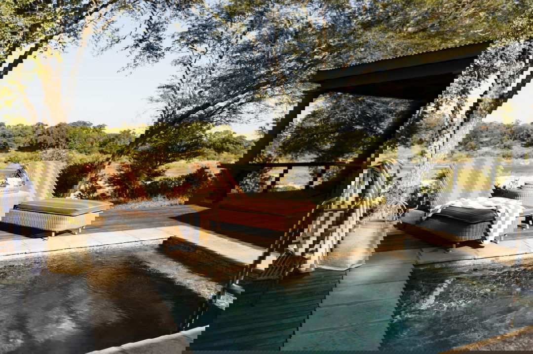 splash pool and deck with loungers at MalaMala