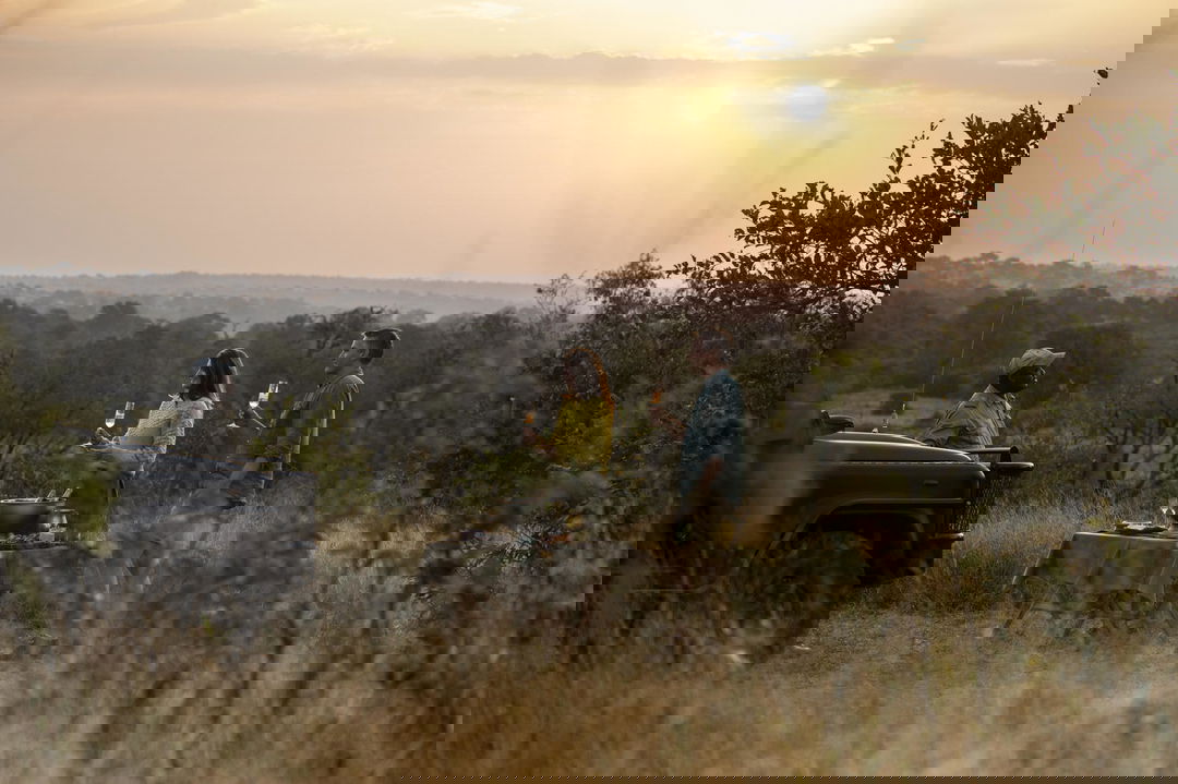 sundowners with guide and guests at Rattrays camp MalaMala game Reserve
