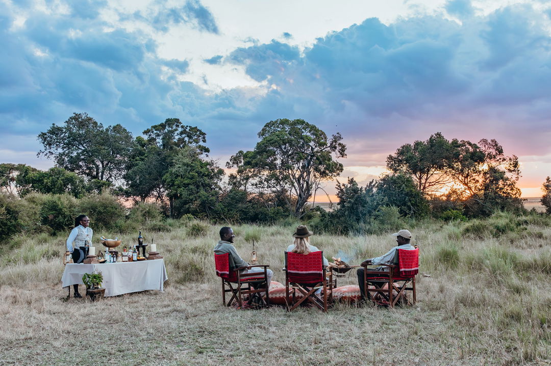 sundowners by the drawbridge of Mara Plains Camp Kenya Masai Mara