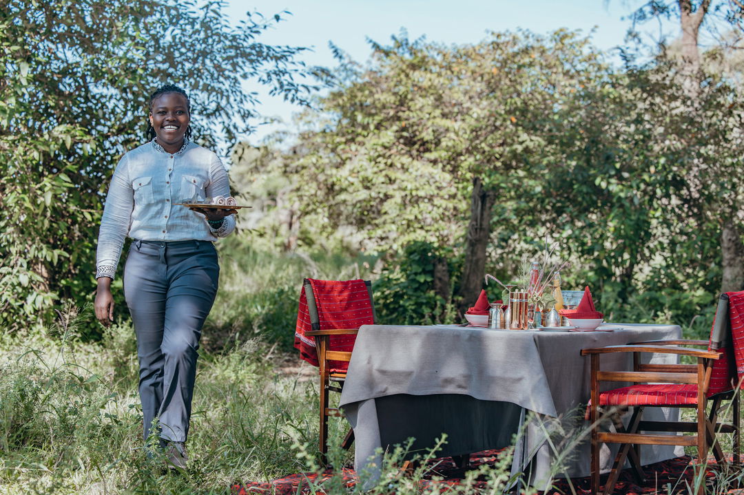 lunch setting in the bush by Mara Plains Camp Kenya Masai Mara