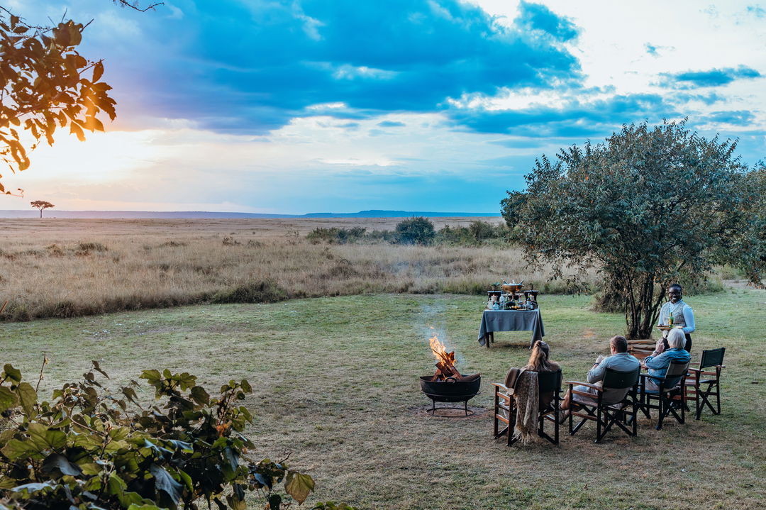sunset view of fireplace outside Mara Plains Camp Kenya Masai Mara