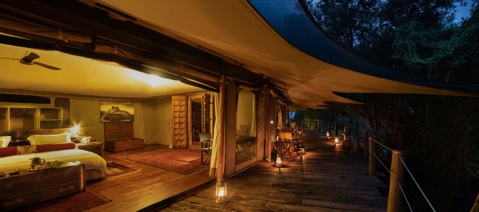 side view of Jahazi suite deck at night by Mara Plains Camp Kenya Masai Mara
