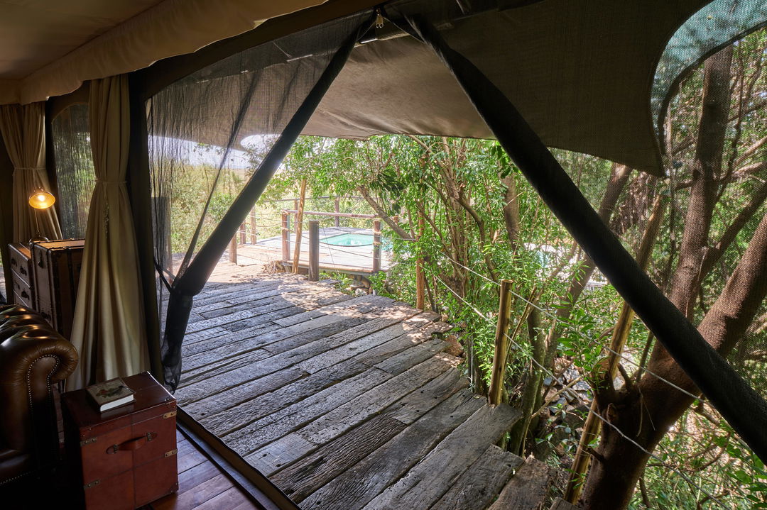 deck of Jahazi suite leading to pool at Mara Plains Camp Kenya Masai Mara