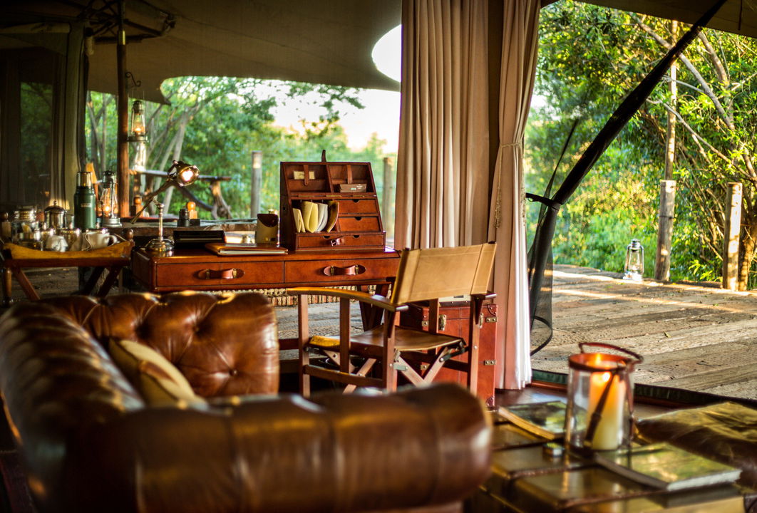 desk with lounge in foreground in a suite of Mara Plains Camp Kenya Masai Mara