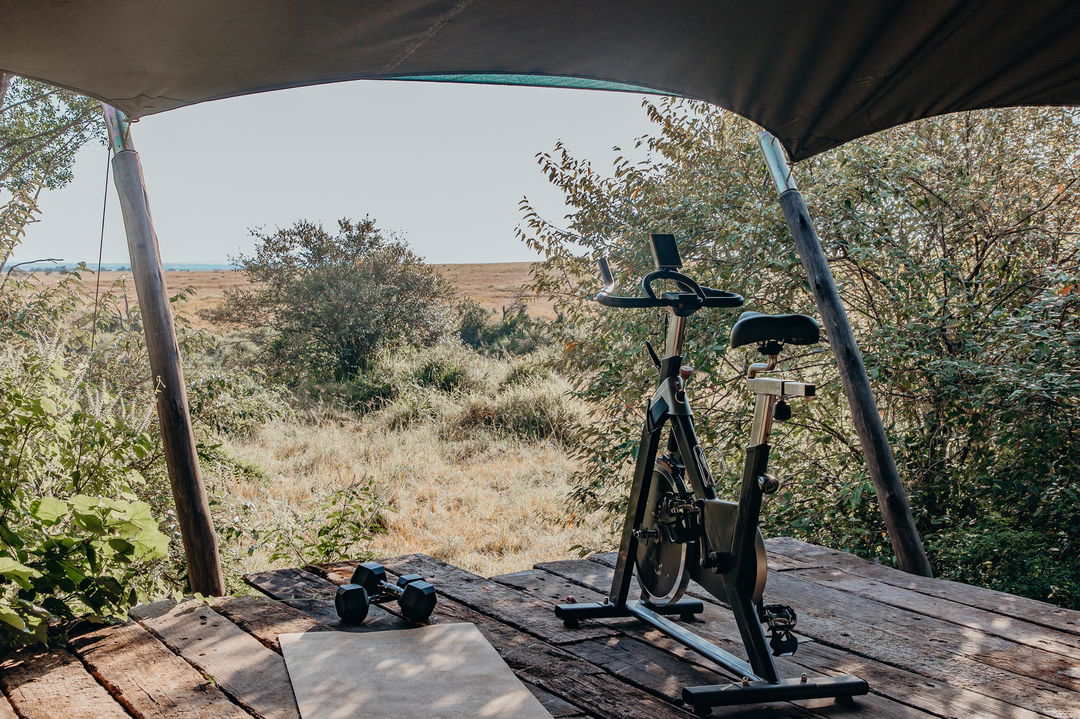 gym equipment on deck of suite at Mara Plains Camp Kenya Masai Mara