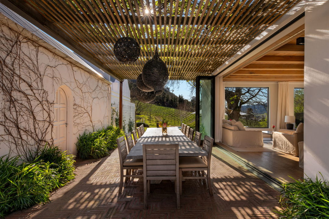 outdoors dining facility at Virgin Unlimited Mont Rochelle Luxury Hotel in Franshoek