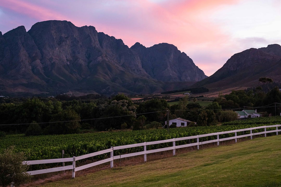 sunset backdrop of mountain from Mont Rochelle Luxury Hotel in Franshoek