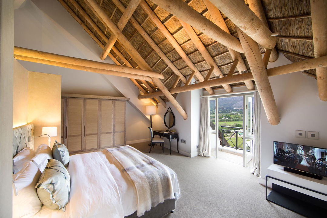 bedroom view of a luxury suite at Mont Rochelle Wine Estate