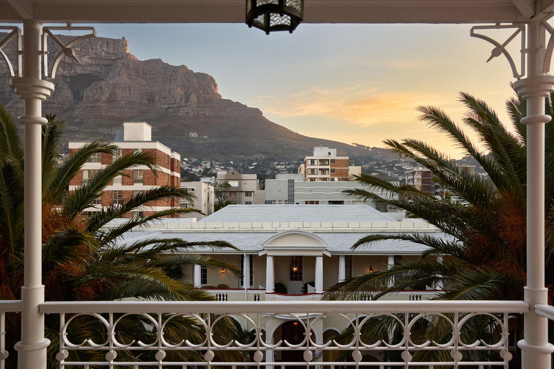 view of mountain and city from the balcony of room at Mount Nelson hotel Cape Town