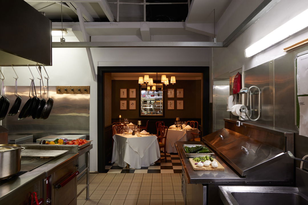 exclusive tables and seating for a personal dinner next to gourmet kitchen at Mount Nelson Hotel Cape Town